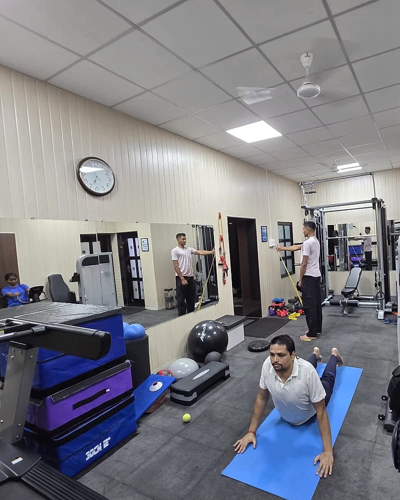 Healwell’s rehab gym with exercise mats, therapy balls and resistance equipment during a supervised session